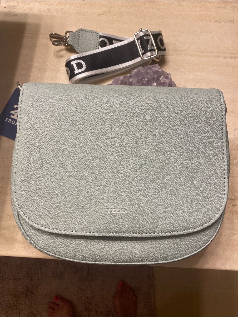 Izod Pastel Sage gray Crossbody with Branded Black-and-White Strap